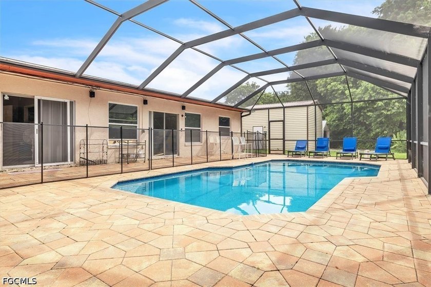 Situated on a spacious 0.65-acre corner lot surrounded by mature - photo 3