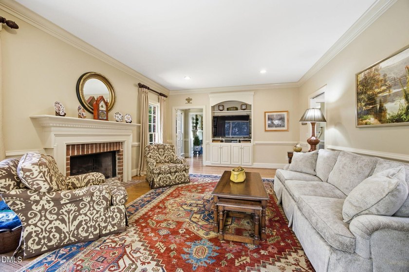 Set on a beautifully landscaped and private 0.51-acre homesite - photo 13