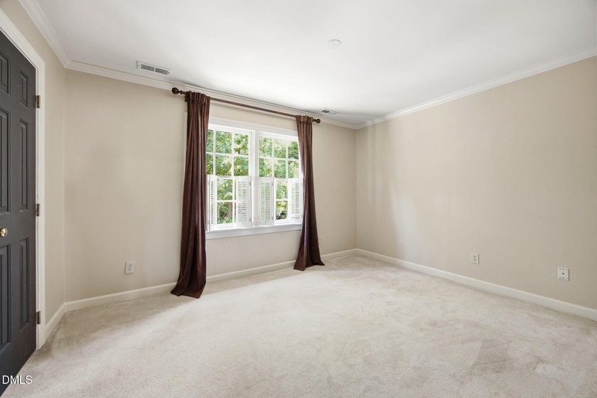 Set on a beautifully landscaped and private 0.51-acre homesite - photo 32