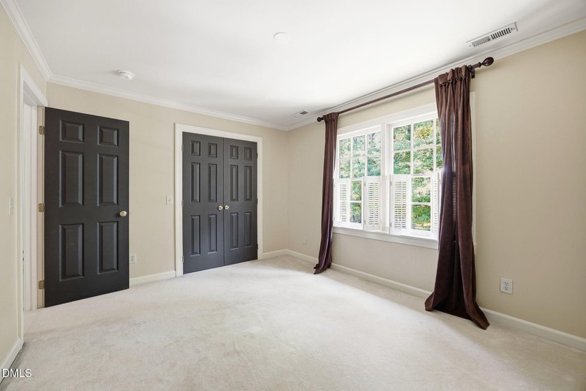Set on a beautifully landscaped and private 0.51-acre homesite - photo 33