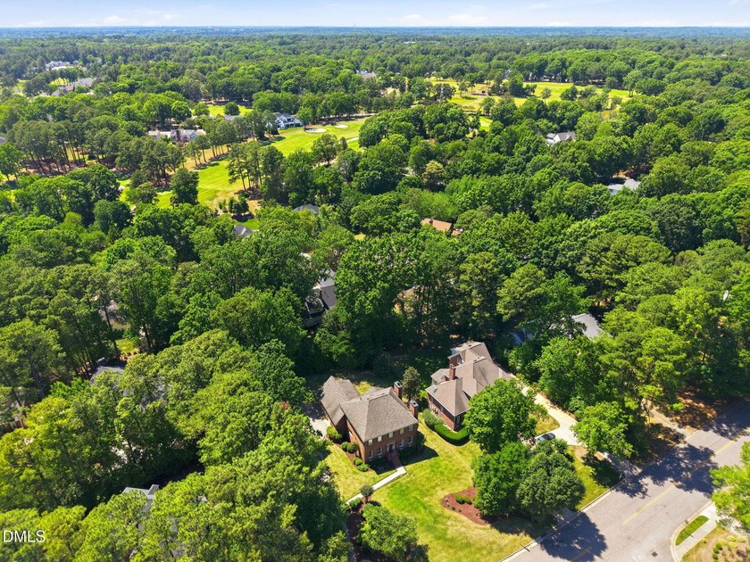 Set on a beautifully landscaped and private 0.51-acre homesite - photo 45
