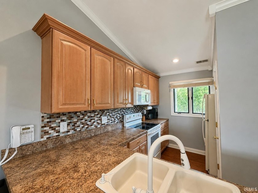 Enjoy beautiful views of Lake Monroe from both the living room - photo 8