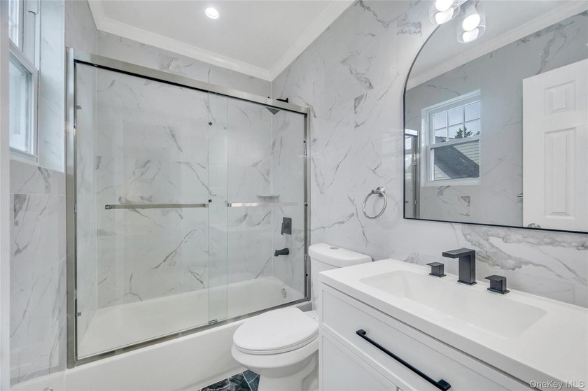 Introducing a stunning 2026-built legal two-family home situated - photo 21