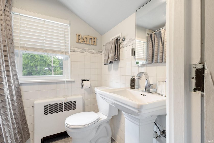 1866 Greenleaf Blvd is a timeless brick home offering space - photo 22