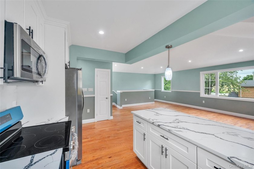 Introducing a stunning 2026-built legal two-family home situated - photo 34