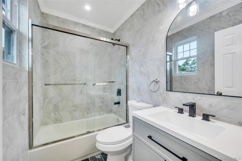Introducing a stunning 2026-built legal two-family home situated - photo 42