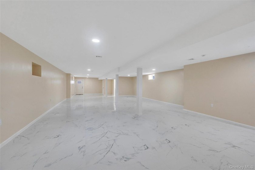 Introducing a stunning 2026-built legal two-family home situated - photo 45