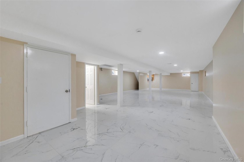 Introducing a stunning 2026-built legal two-family home situated - photo 46