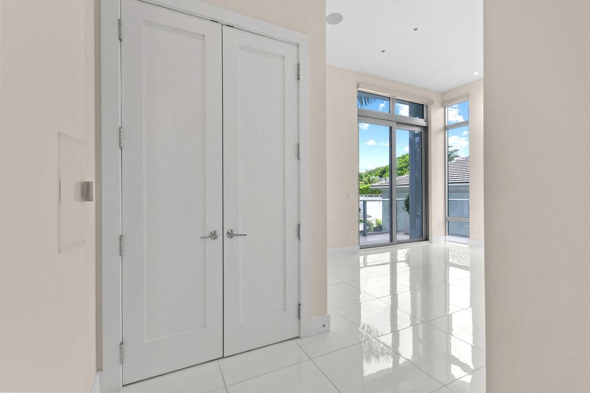 Step through the lobby level entry into ceilings that hold at - photo 40