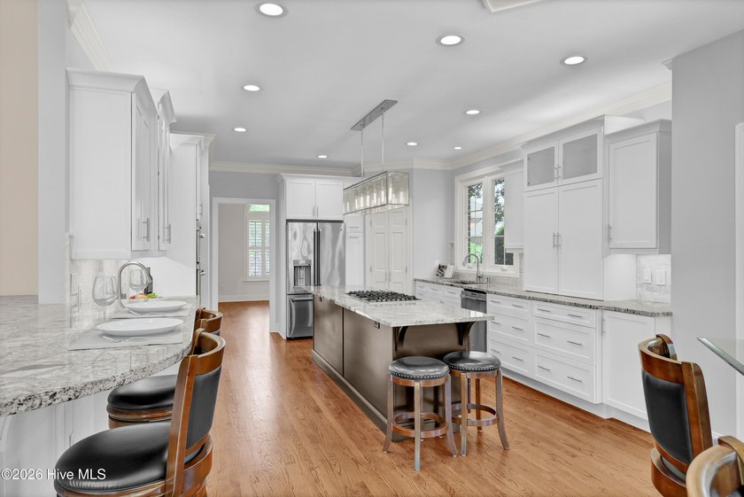 Nestled on a peaceful pond in the gated community of Landfall - photo 11
