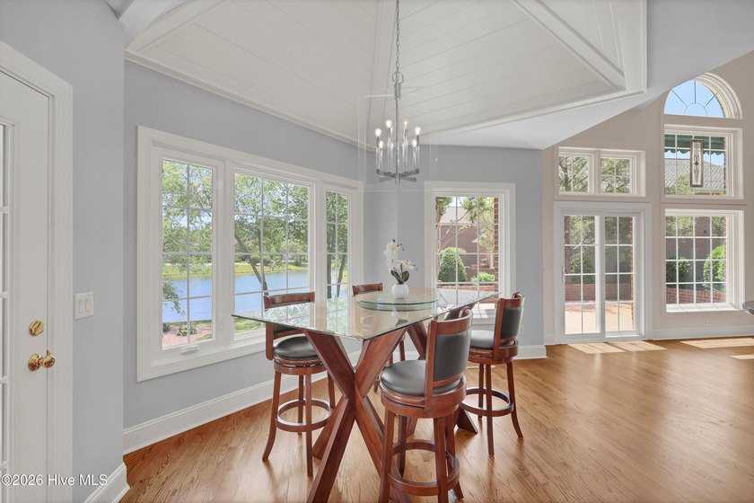 Nestled on a peaceful pond in the gated community of Landfall - photo 14