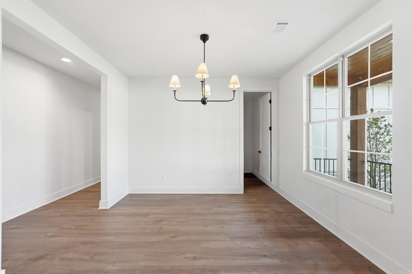 This 4 bed, 3.5 bath home sits on a flat 0.5 acre lot with 115' - photo 7