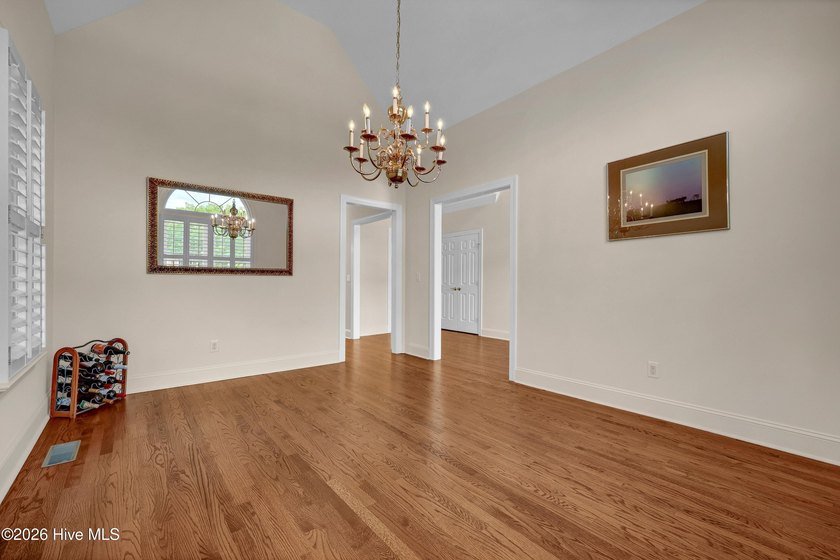 Nestled on a peaceful pond in the gated community of Landfall - photo 24