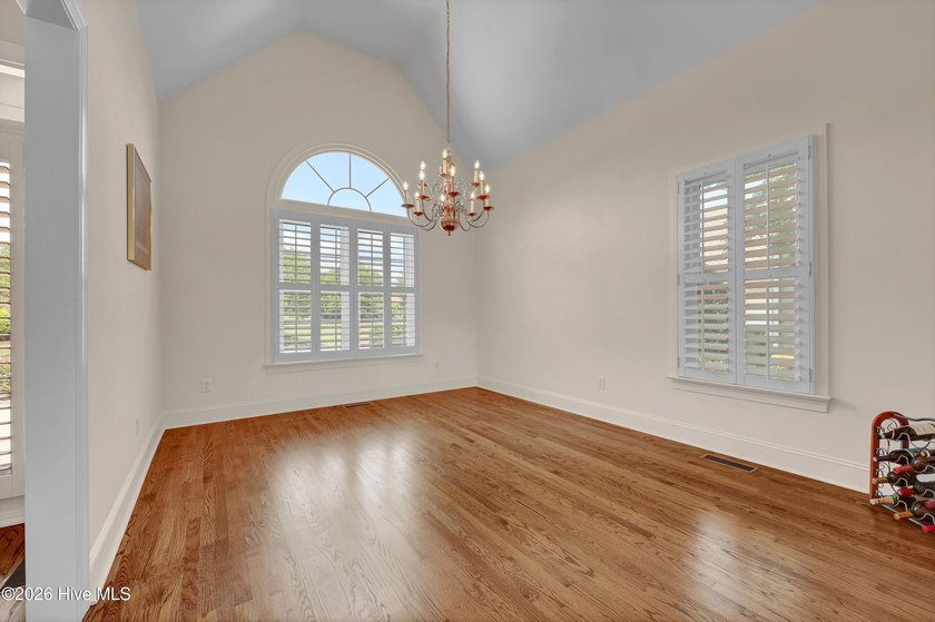 Nestled on a peaceful pond in the gated community of Landfall - photo 25