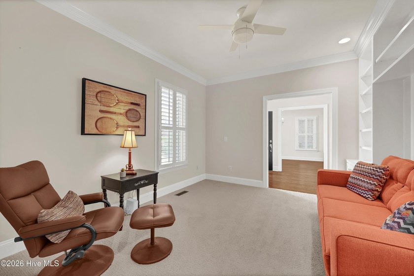 Nestled on a peaceful pond in the gated community of Landfall - photo 27