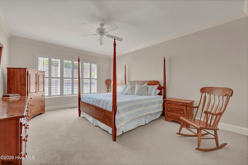 Nestled on a peaceful pond in the gated community of Landfall - photo 30
