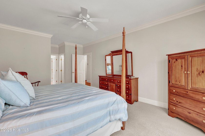 Nestled on a peaceful pond in the gated community of Landfall - photo 31