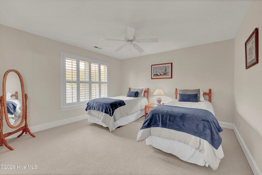 Nestled on a peaceful pond in the gated community of Landfall - photo 41