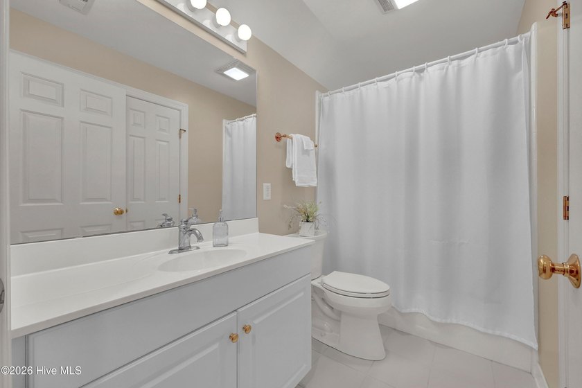 Nestled on a peaceful pond in the gated community of Landfall - photo 43