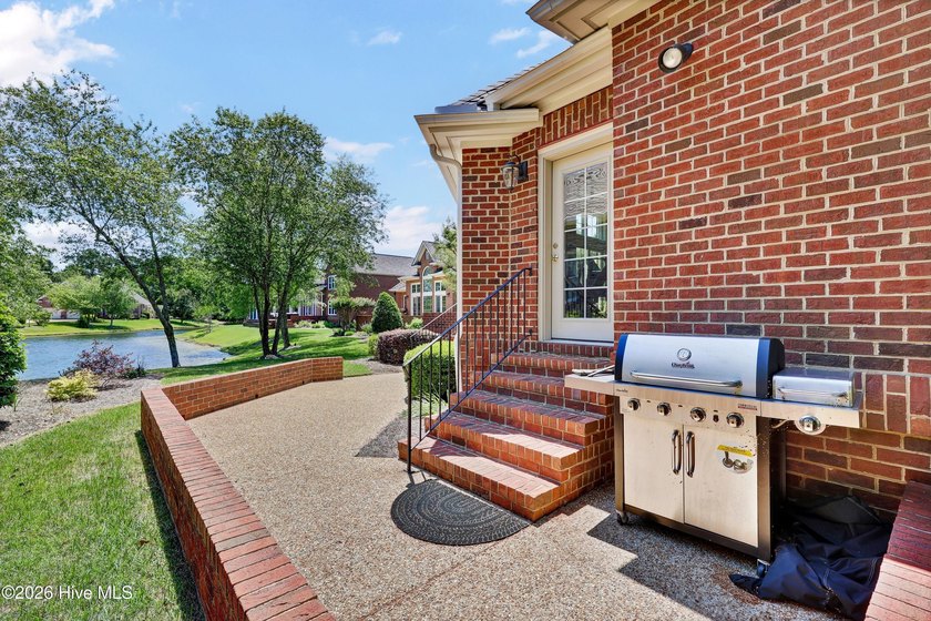 Nestled on a peaceful pond in the gated community of Landfall - photo 47