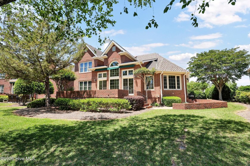 Nestled on a peaceful pond in the gated community of Landfall - photo 49