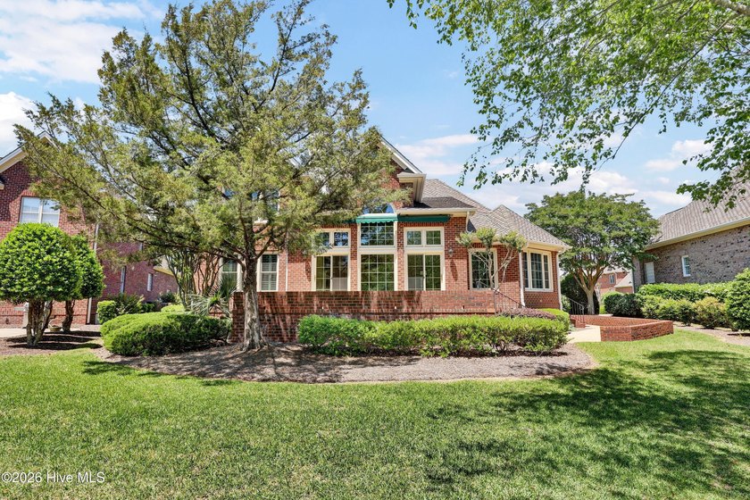 Nestled on a peaceful pond in the gated community of Landfall - photo 50