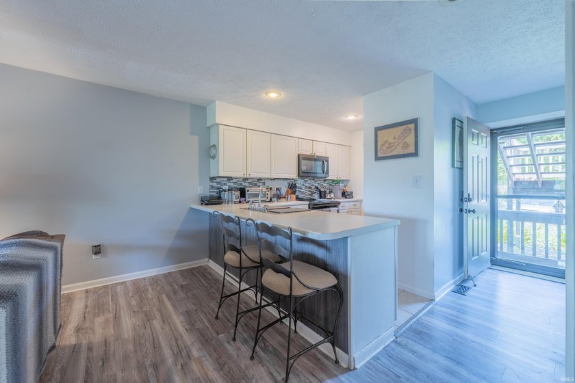 Enjoy this easily accessible first-floor Water's Edge 2-bedroom - photo 11