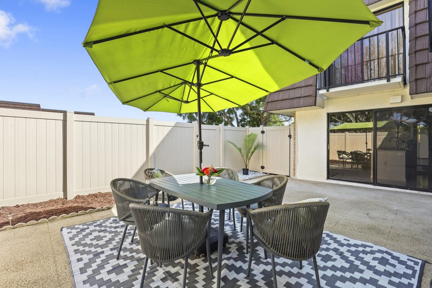 Charming 2-bedroom townhouse with both bedrooms featuring - photo 7