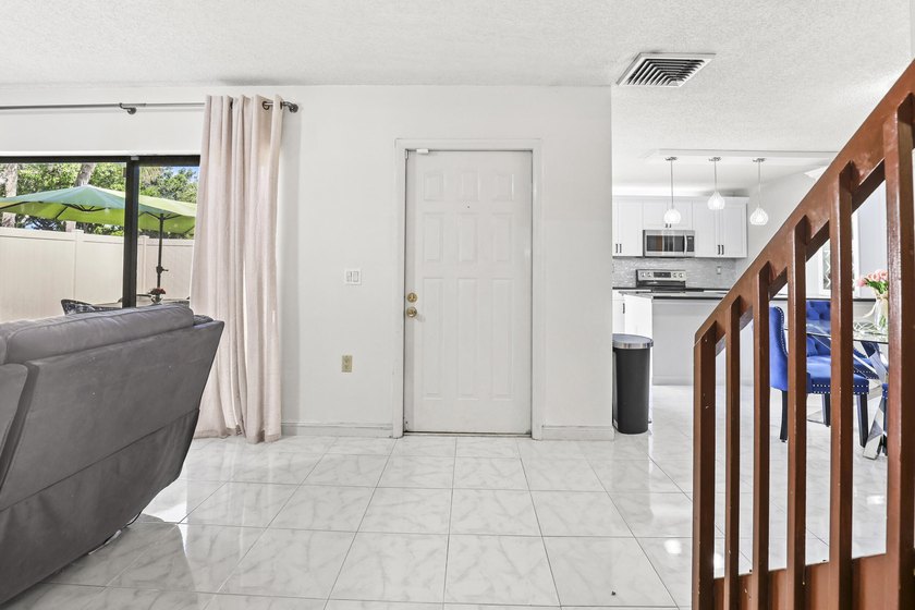 Charming 2-bedroom townhouse with both bedrooms featuring - photo 8