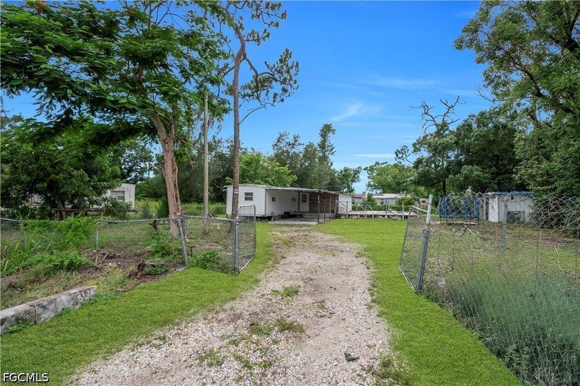 Affordable opportunity in Suncoast Estates! Situated on - photo 5