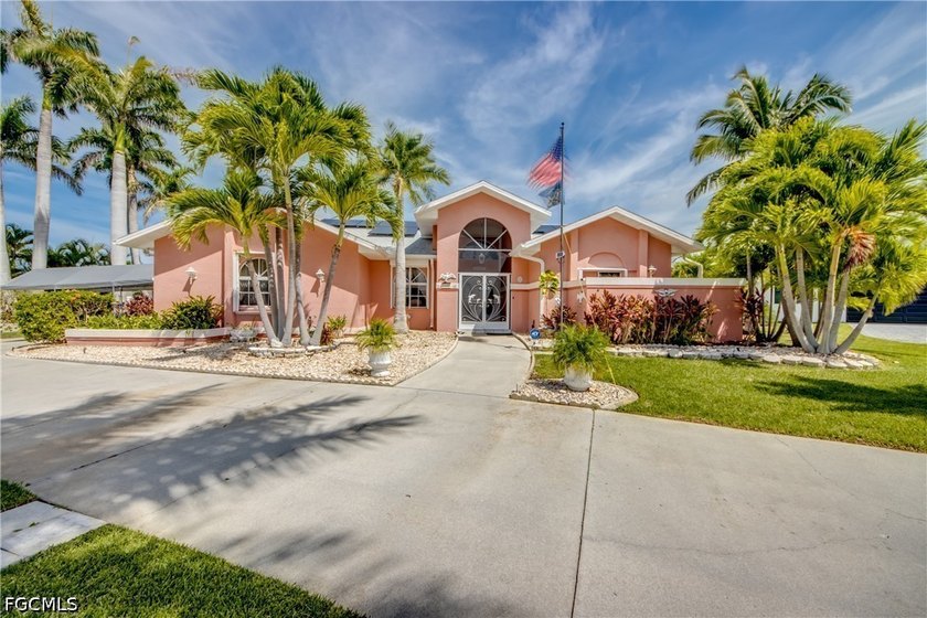 WALK TO CAPE HARBOUR! EXQUISITE CURB APPEAL! Direct Gulf Access - photo 2