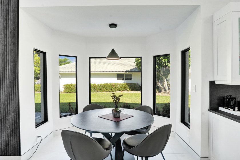 Experience refined South Florida living in this fully renovated - photo 13
