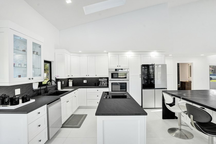Experience refined South Florida living in this fully renovated - photo 14