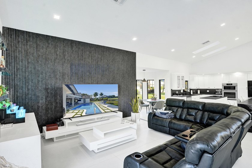Experience refined South Florida living in this fully renovated - photo 17