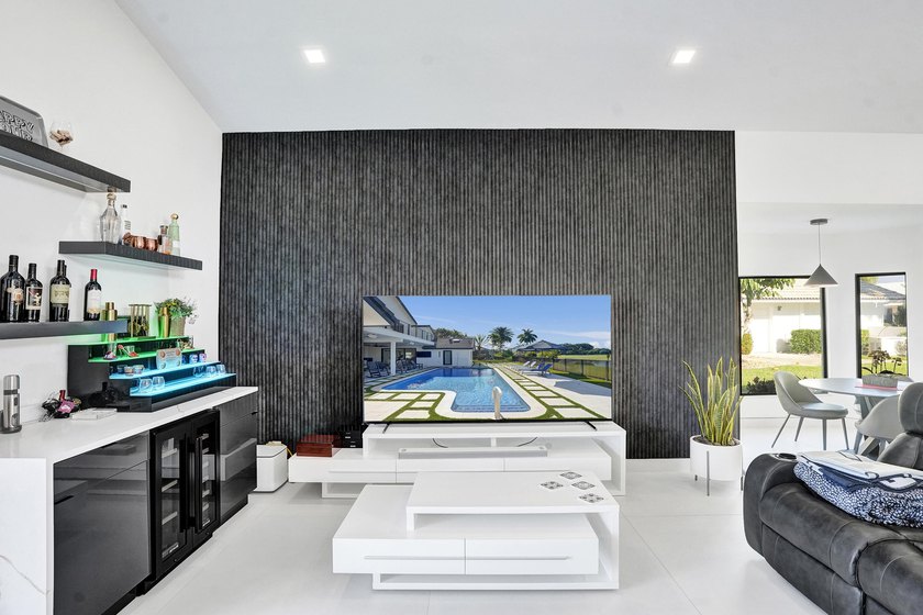 Experience refined South Florida living in this fully renovated - photo 18
