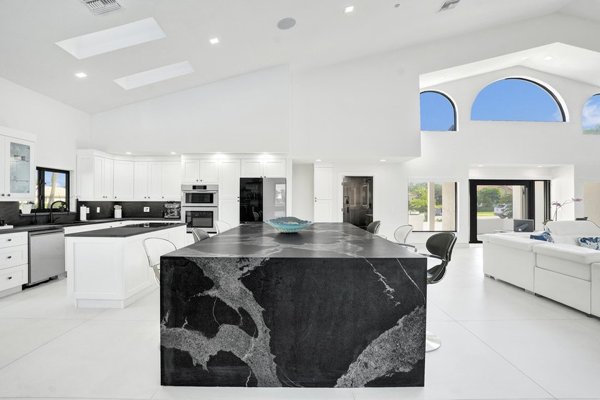 Experience refined South Florida living in this fully renovated - photo 19