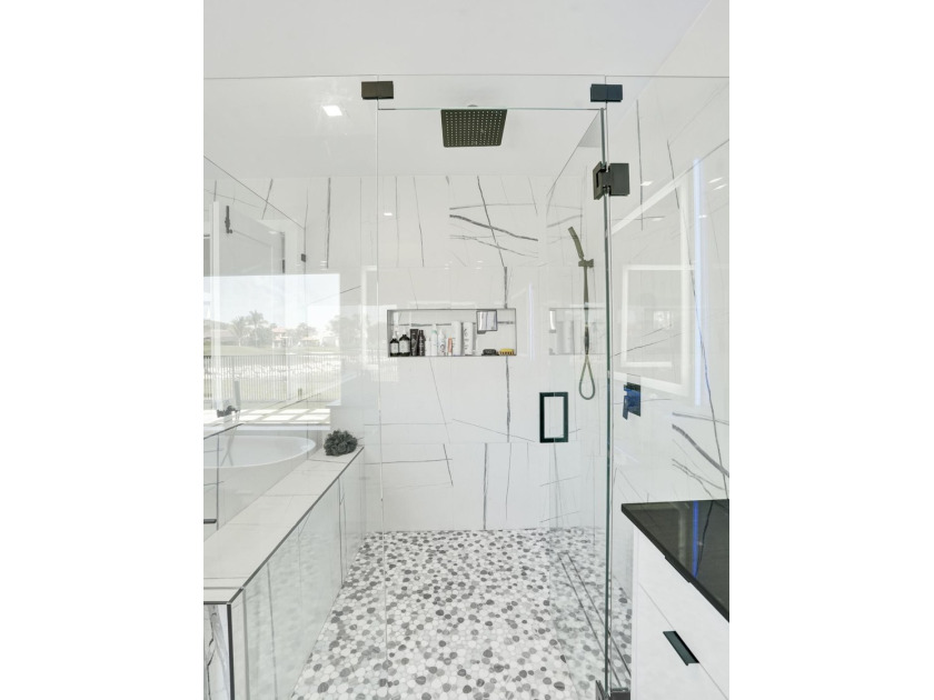 Experience refined South Florida living in this fully renovated - photo 39