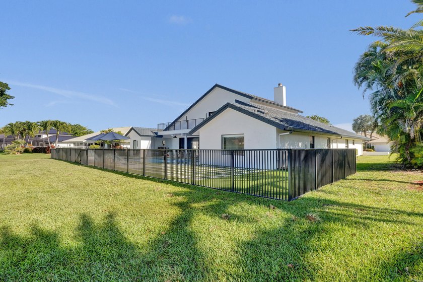 Experience refined South Florida living in this fully renovated - photo 50