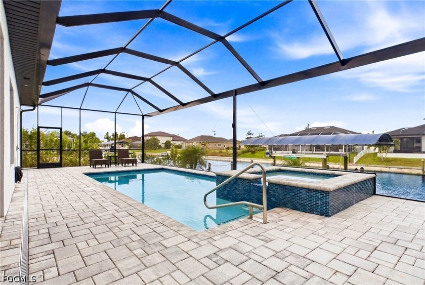 NEW CONSTRUCTION QUALITY WITHOUT THE WAIT. Built in 2023, this - photo 2
