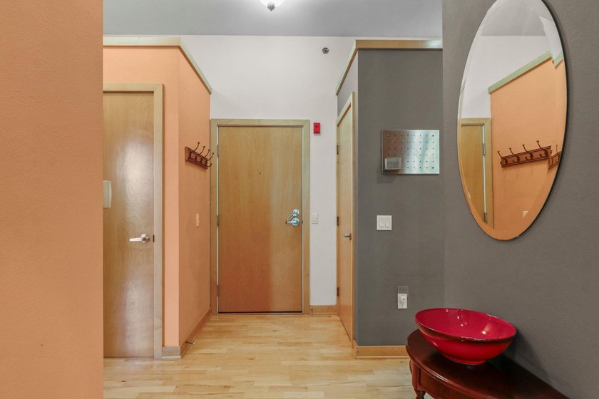 Perched on the top floor, this spacious 1BR condo offers an - photo 2