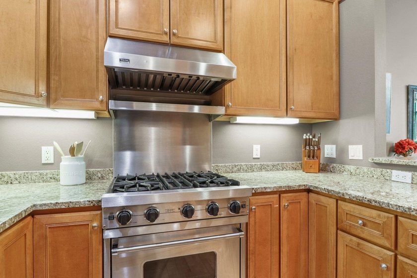 Perched on the top floor, this spacious 1BR condo offers an - photo 6