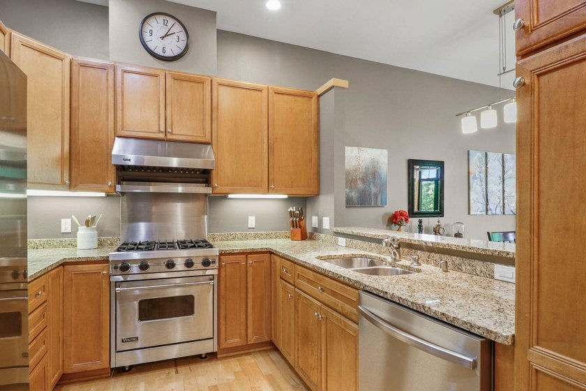 Perched on the top floor, this spacious 1BR condo offers an - photo 10