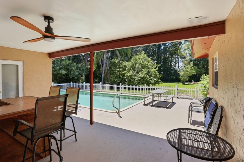Welcome to this exceptional single-family home in the highly - photo 13