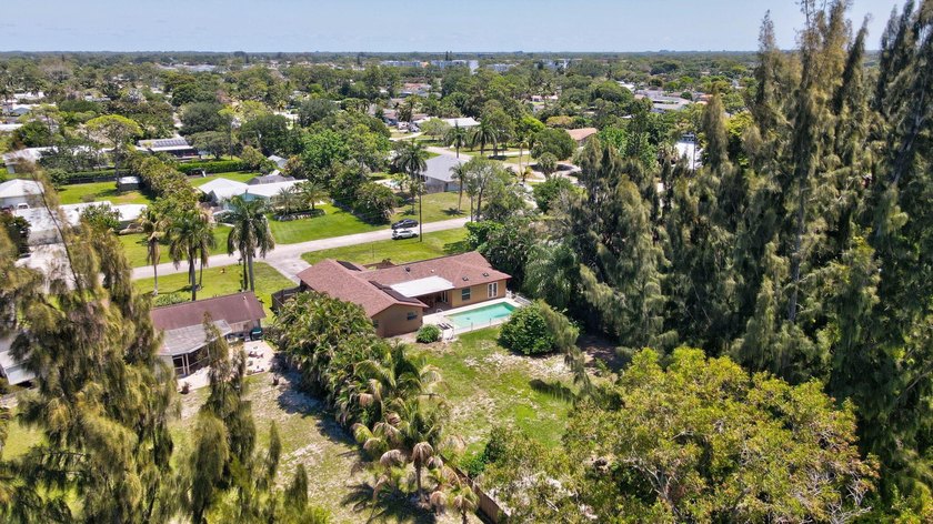 Welcome to this exceptional single-family home in the highly - photo 49