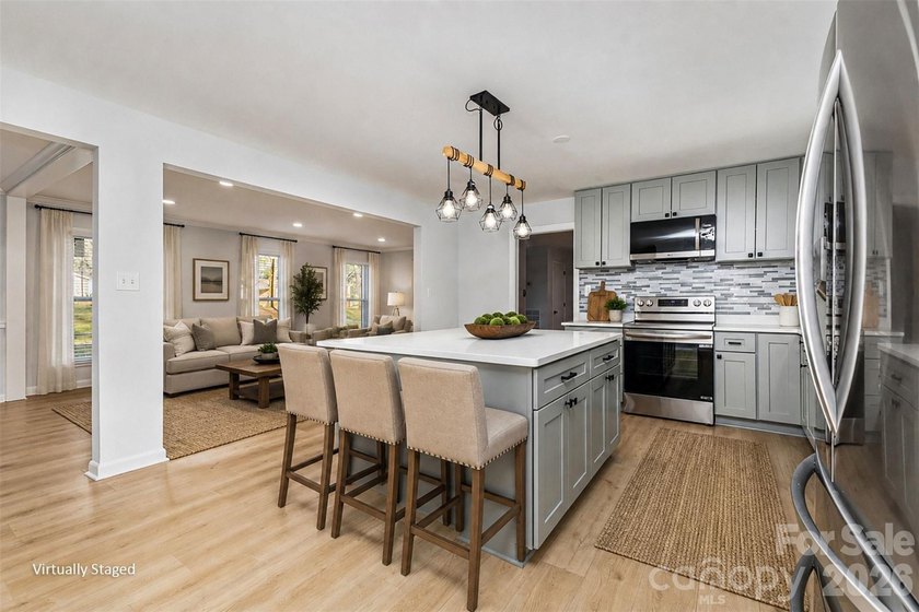 Welcome to nearly 3,000 square feet. This property sits on - photo 3