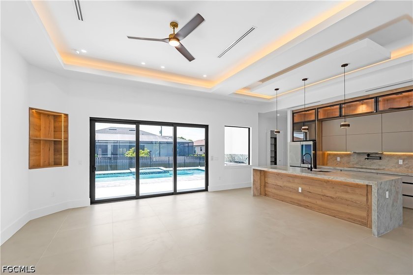 Luxury meets modern design in this exceptional 3-bedroom + den - photo 3