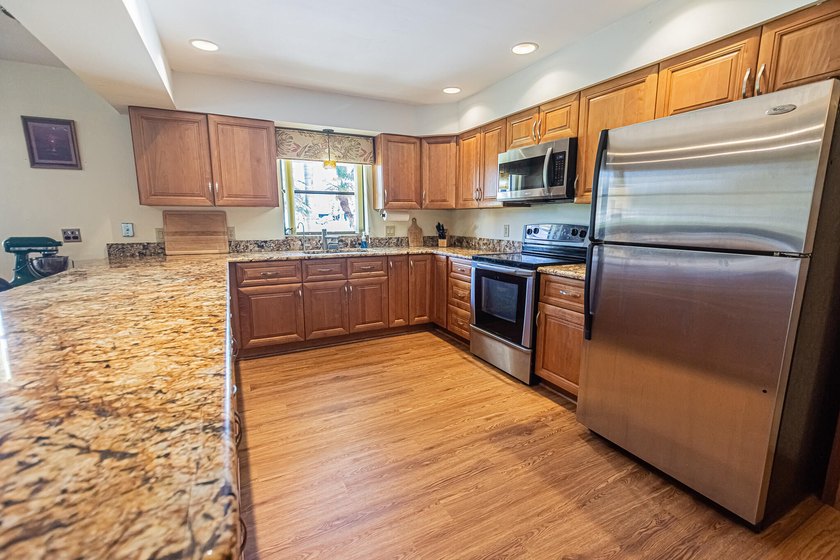 Tropical living awaits in Sandpiper Bay! Situated on an - photo 7