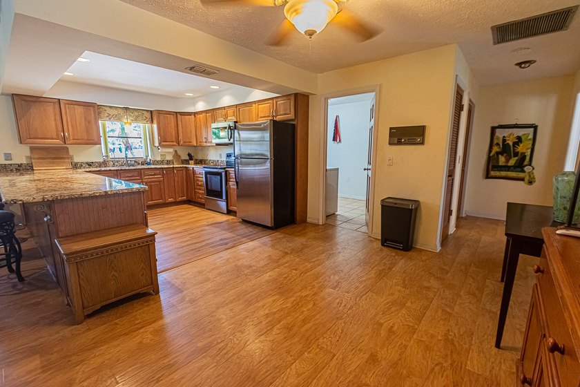 Tropical living awaits in Sandpiper Bay! Situated on an - photo 8