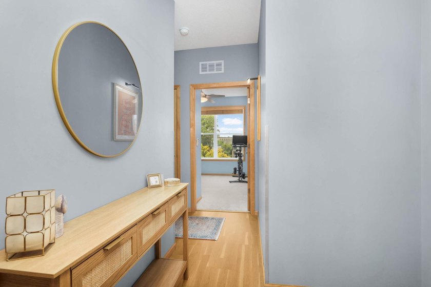 This beautifully updated end-unit condo is filled with natural - photo 3