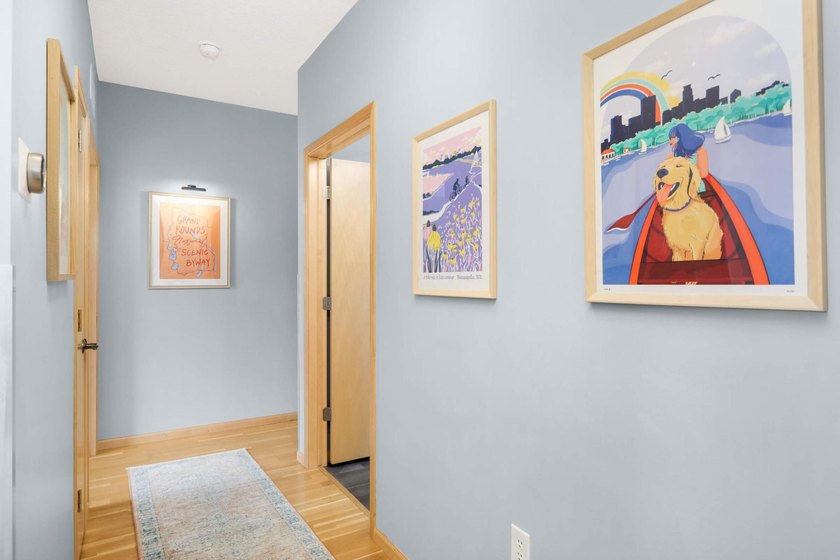 This beautifully updated end-unit condo is filled with natural - photo 4